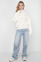 Knitted sweater with hearts