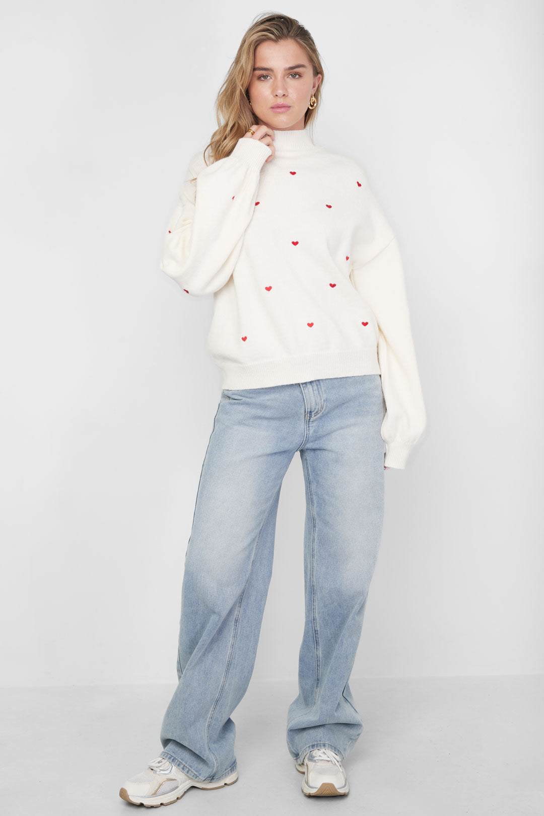 Knitted sweater with hearts