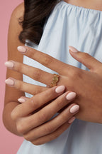 Adjustable twisted ring