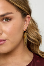 Hoop earrings with hanging chains and heart