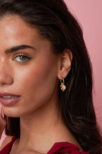 Earrings with heart and bead pendants