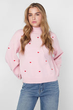 Knitted sweater with hearts