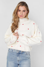 Knitted sweater with hearts