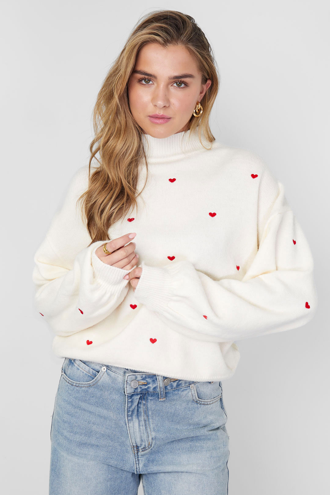 Knitted sweater with hearts
