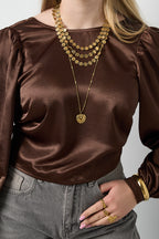 Necklace with flat details and large pendant