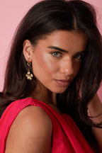 Earrings with flower pendants in various sizes