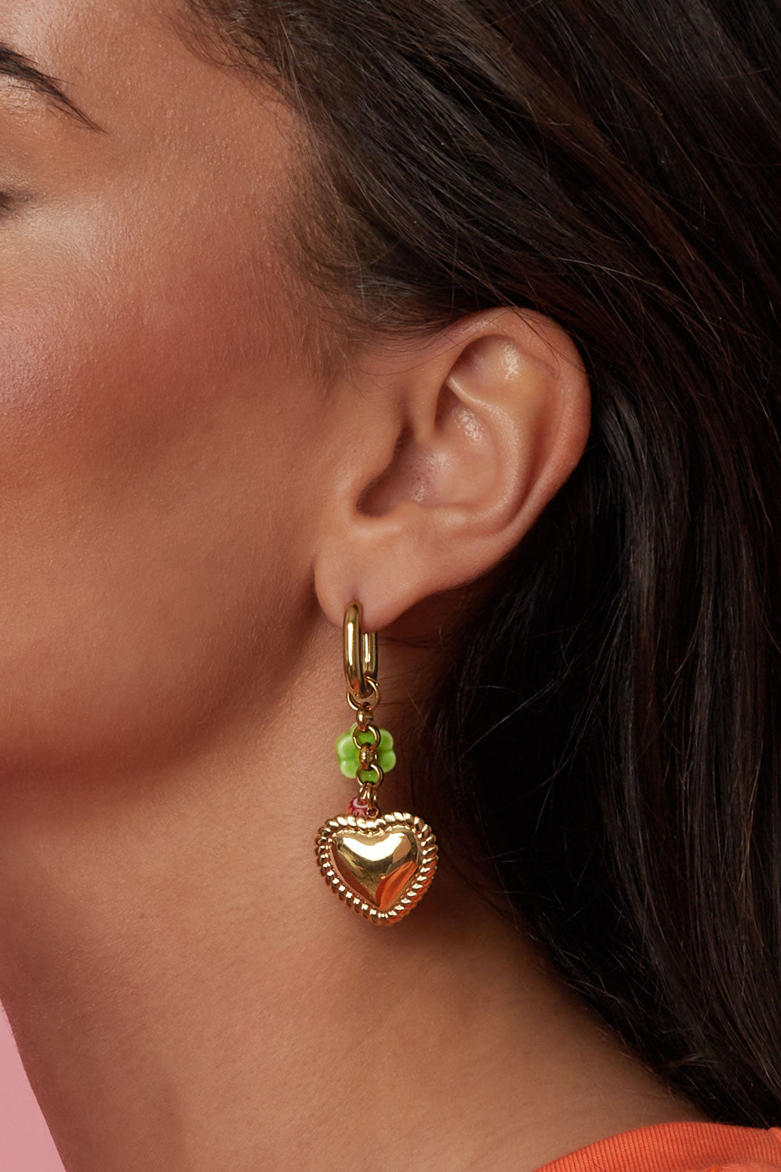 Earrings with colorful beads and detailed heart charm